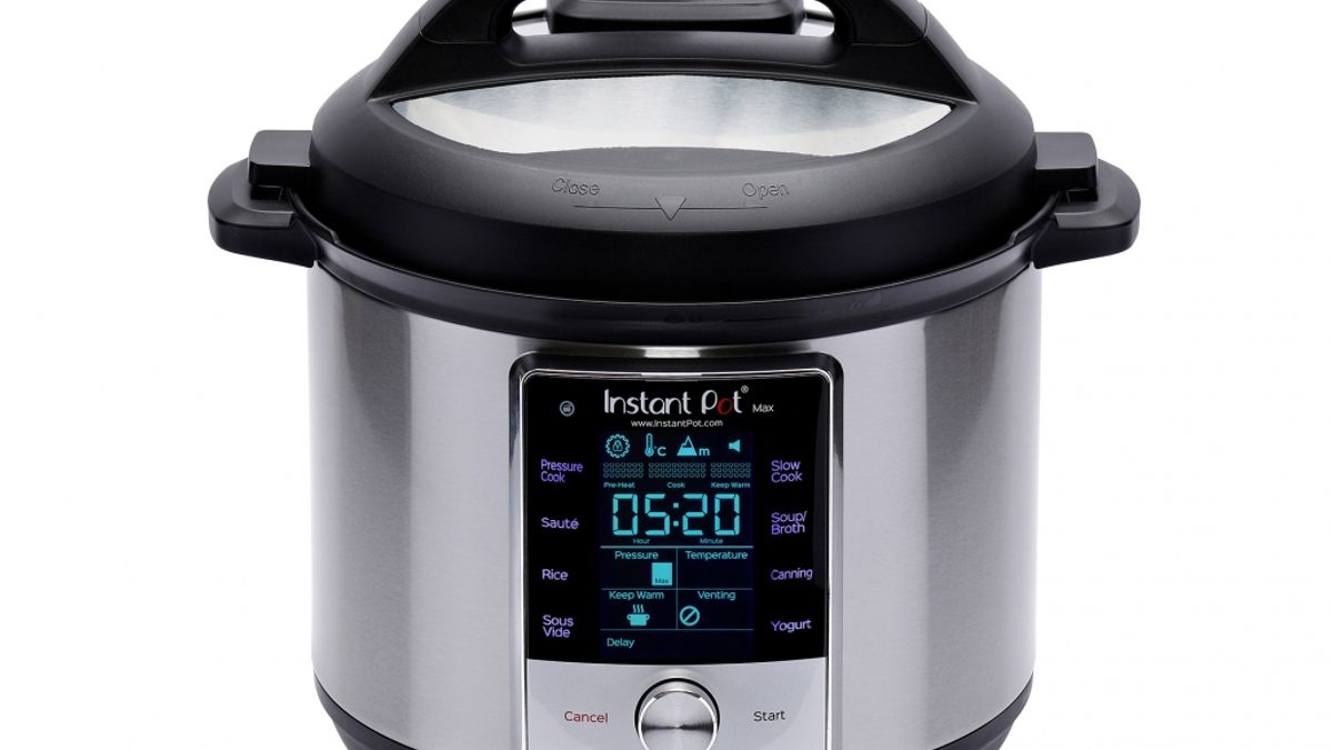 An Instant Pot digital cooker with the control panel illuminated on a white background